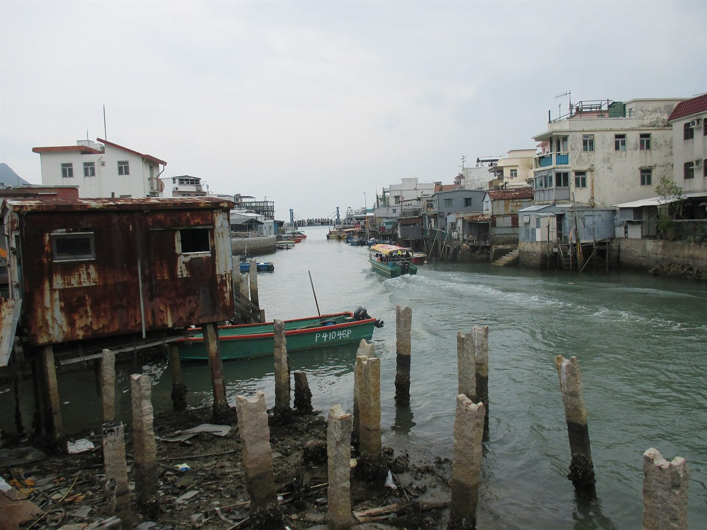 Wooden stilt houses over a creek in Tai O fishing village on Lantau