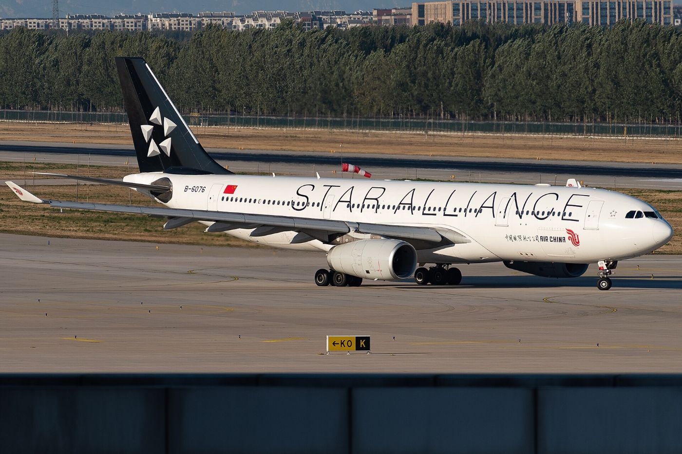 An Air China Airbus A330 in Star Alliance livery taxiing at Beijing airport